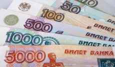 سعر العملة الروسية انخفض لما دون العتبة الرمزية البالغة 80 روبلا للدولار